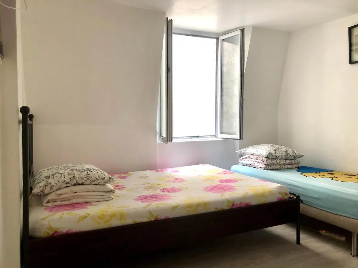 Séjour chez l'habitant Appartement Art Beaubourg à Paris France
